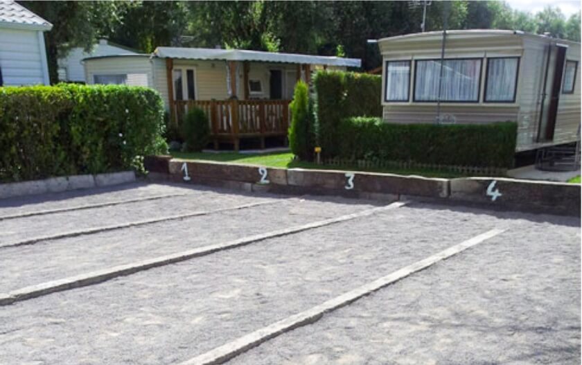 Petanque area at Le Grand Marais campsite in Pas-de-Calais, next to the mobile homes for rent